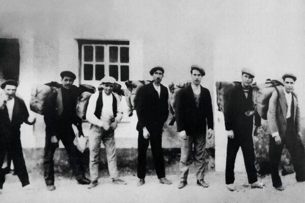 With sacks on their backs, loaded with coffee, the smugglers cross the Spanish border. Joaquim dos Santos Nabeiro is the fourth in the photo.